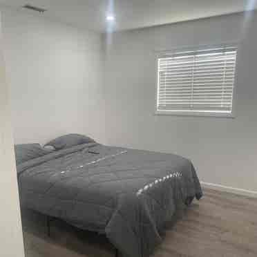 Large room with queen size bed.