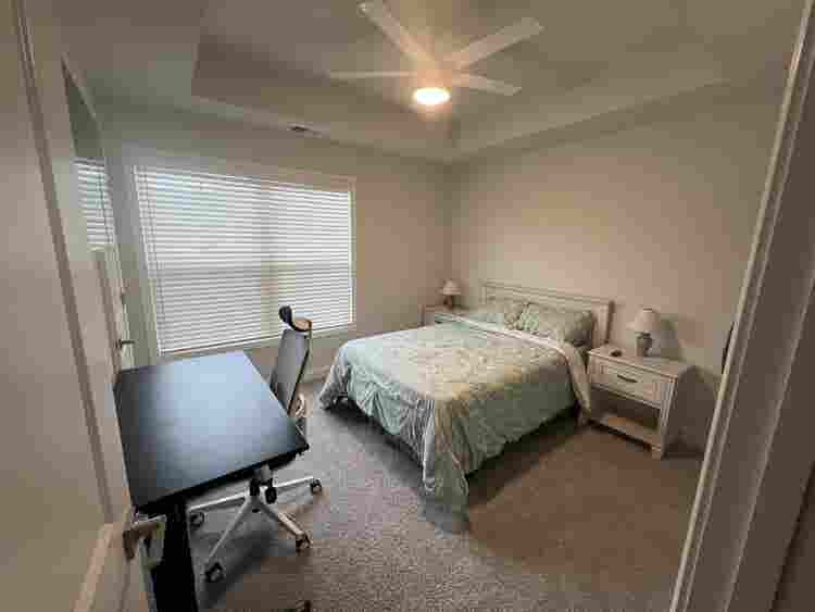 Bedroom w/ private bathroom.