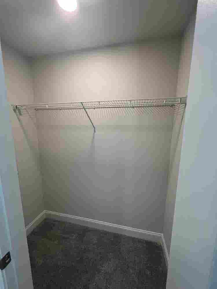 Bedroom w/ private bathroom.