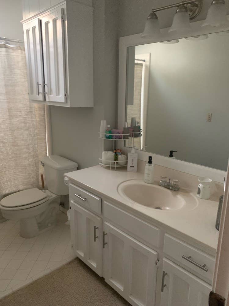 Furnished bedroom w/ private bath