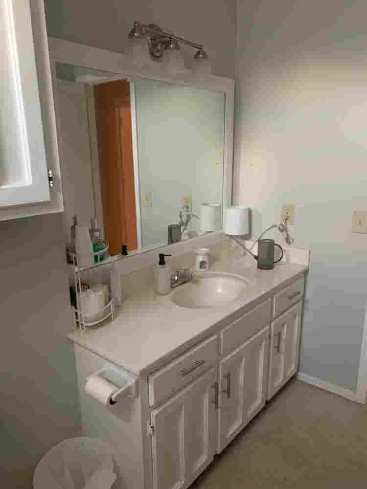 Furnished bedroom w/ private bath