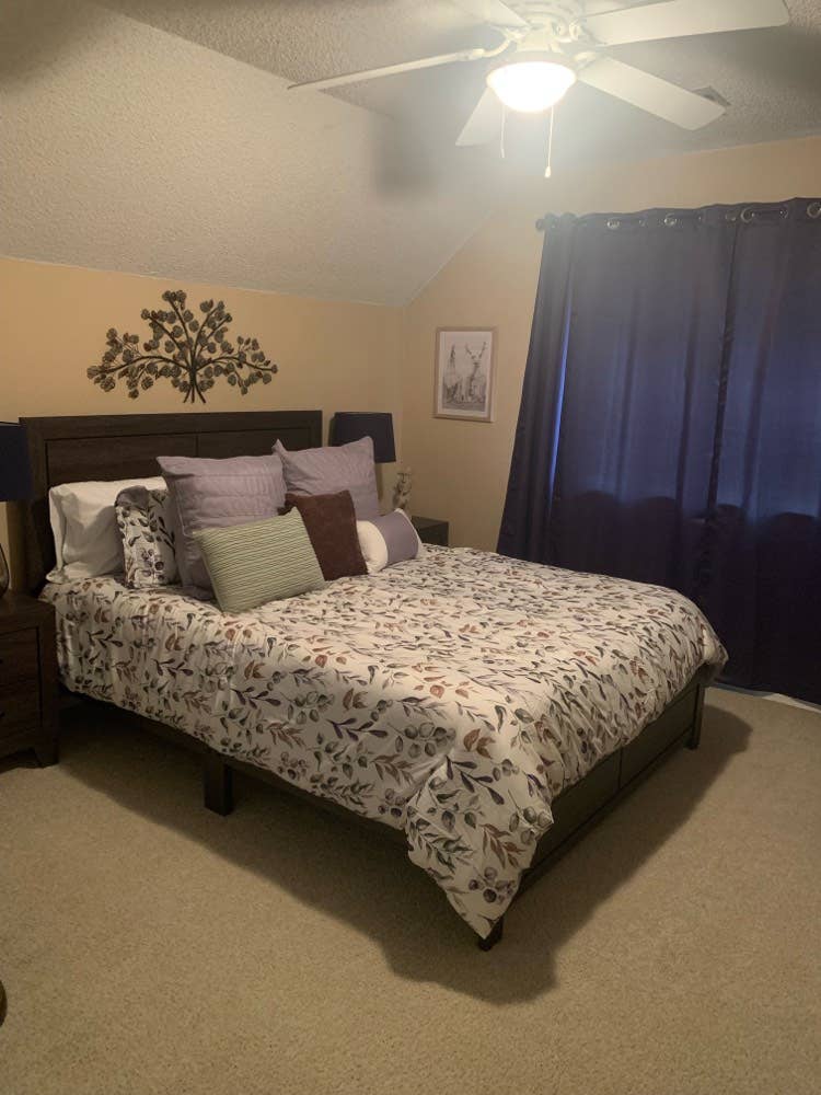 Furnished bedroom w/ private bath