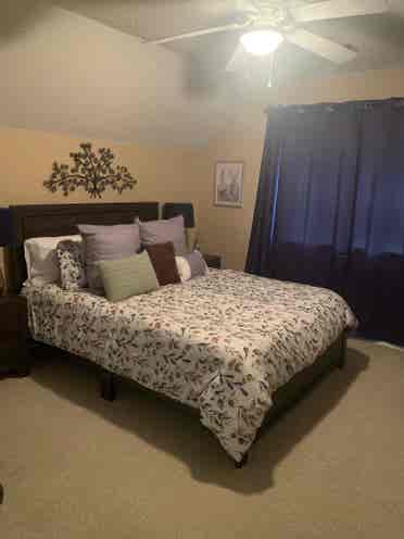 Furnished bedroom w/ private bath
