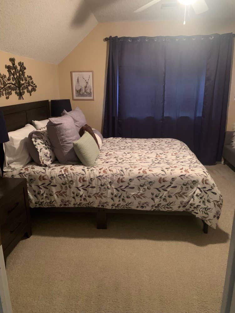 Furnished bedroom w/ private bath