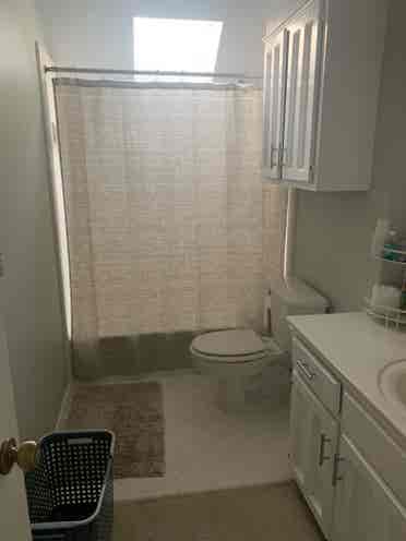 Furnished bedroom w/ private bath