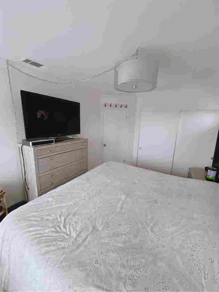 One bedroom with a shared bathroom.