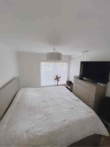 One bedroom with a shared bathroom.