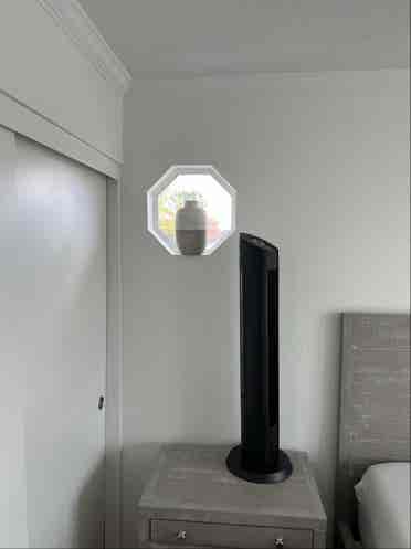 One bedroom with a shared bathroom.