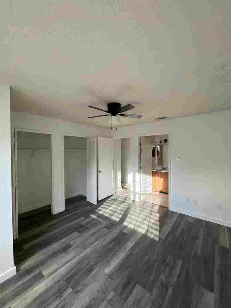 Room with shared bath with utilties