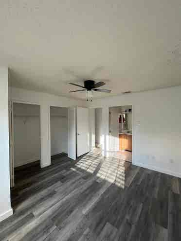 Room with shared bath with utilties