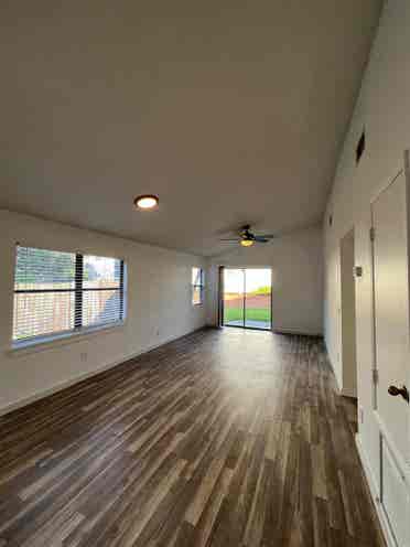 Room with shared bath with utilties
