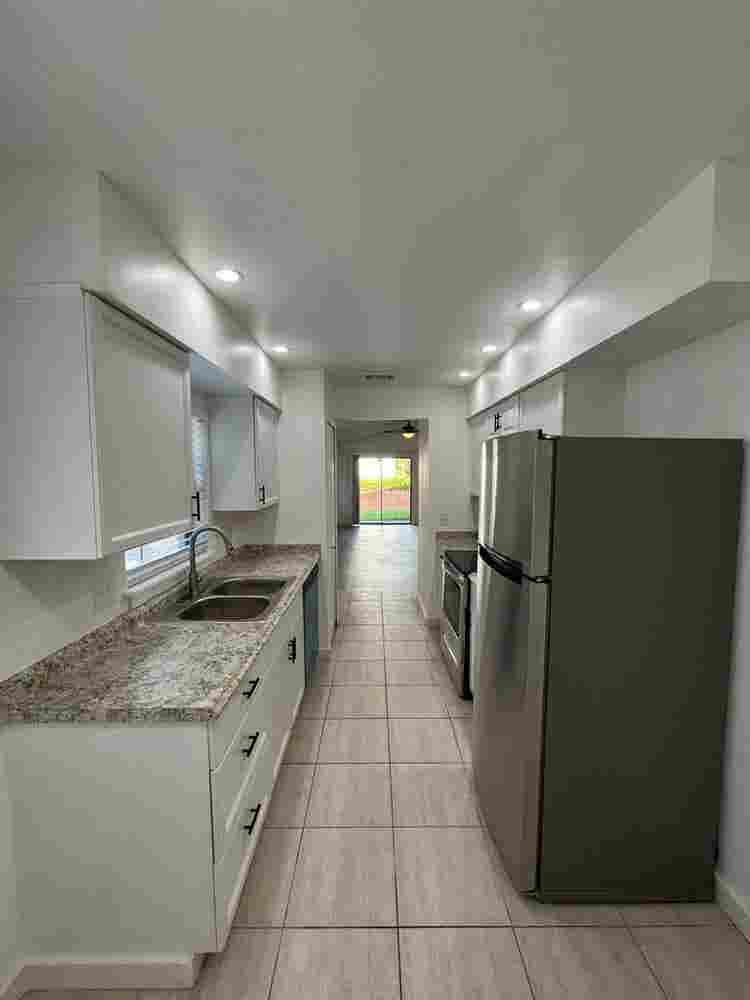 Room with shared bath with utilties