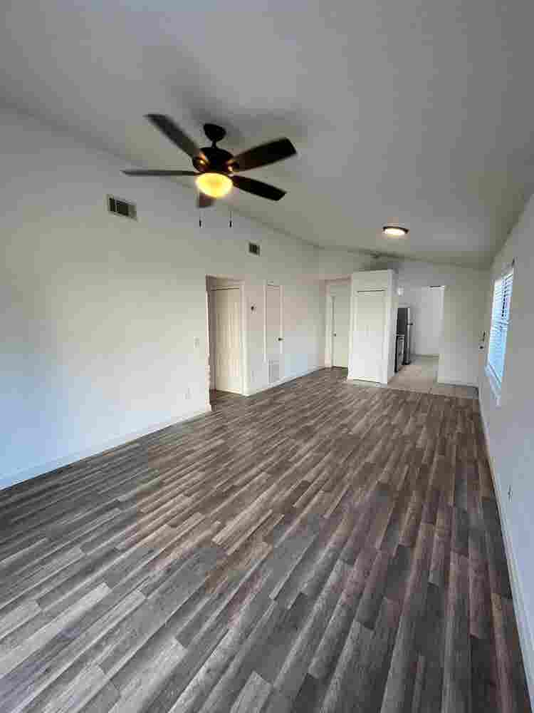 Room with shared bath with utilties