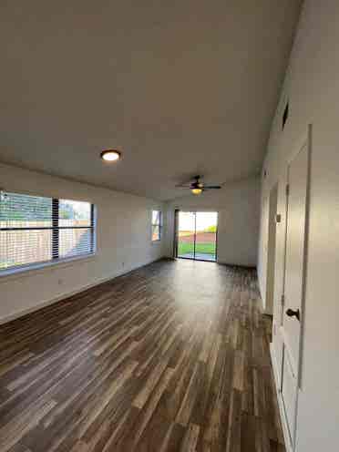 Room with shared bath with utilties