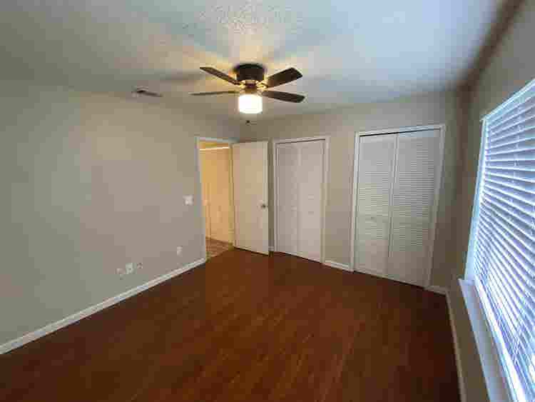Room with shared bath with utilties