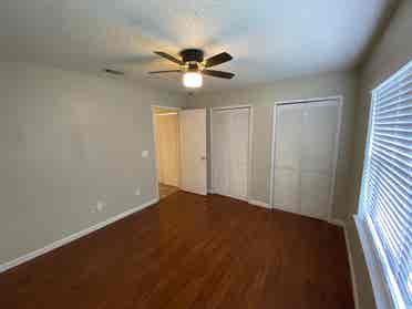 Room with shared bath with utilties