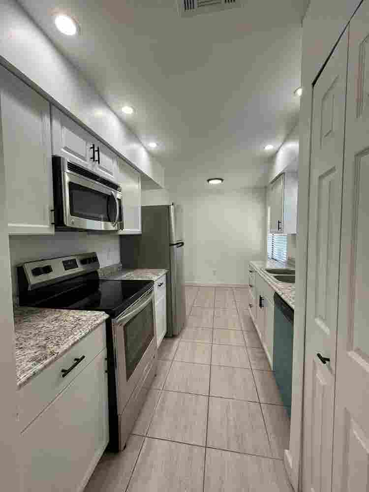 Room with shared bath with utilties