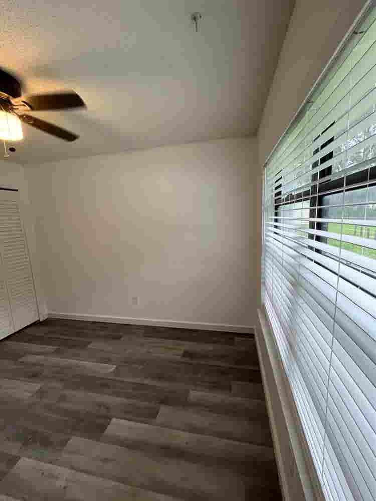 Room with shared bath with utilties