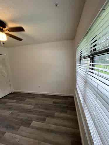 Room with shared bath with utilties