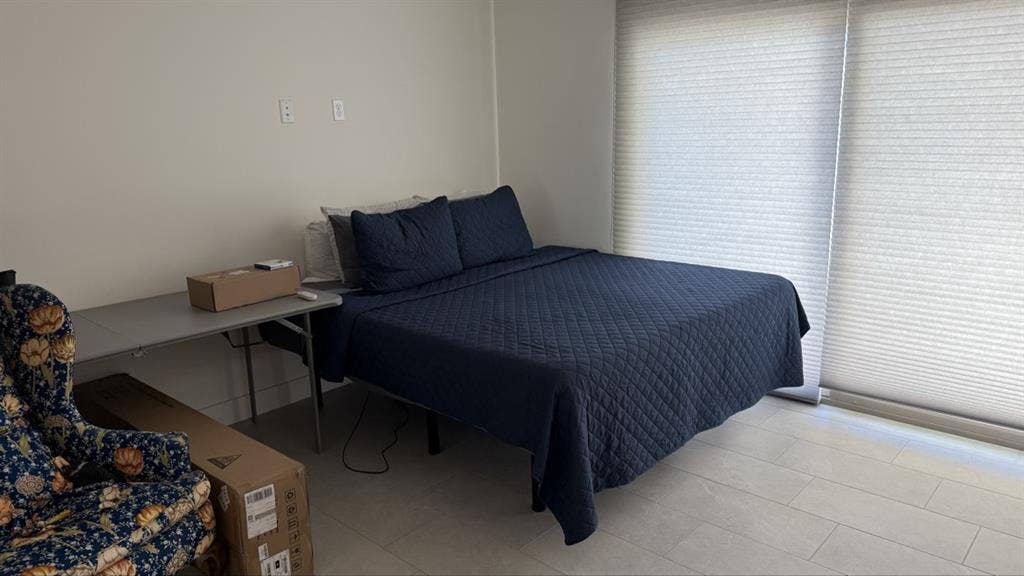 Private furnished bedroom and bath
