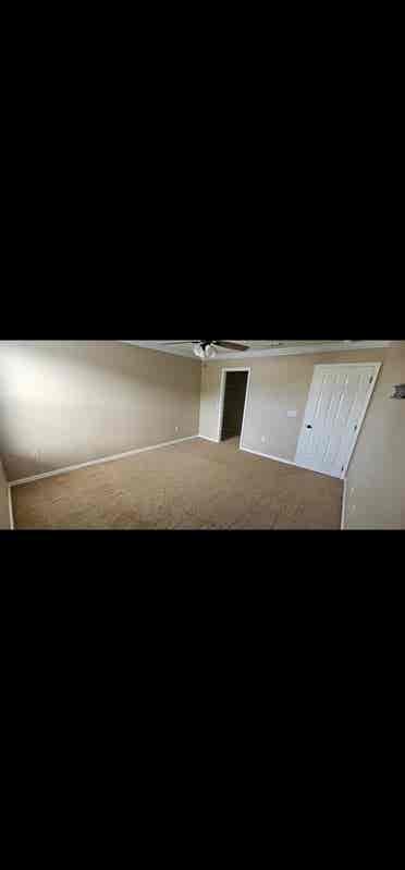 Large room with shared bathroom.
