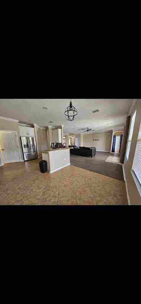Large room with shared bathroom.