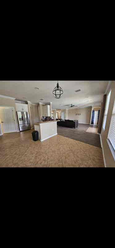 Large room with shared bathroom.