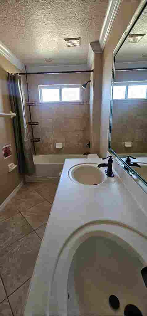 Large room with shared bathroom.