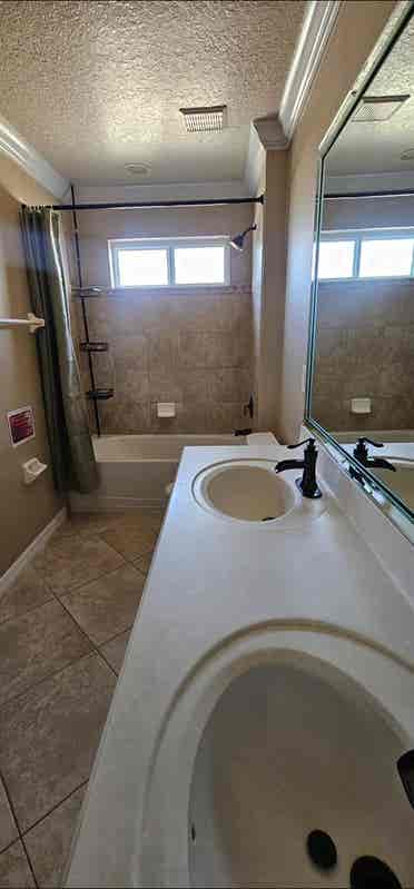 Large room with shared bathroom.