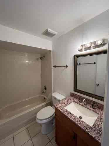 Room/shared Bath with utilities