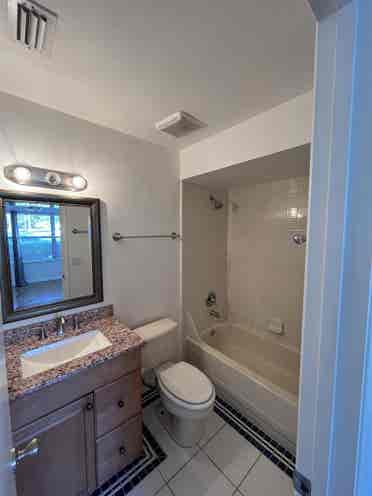 Room/shared Bath with utilities
