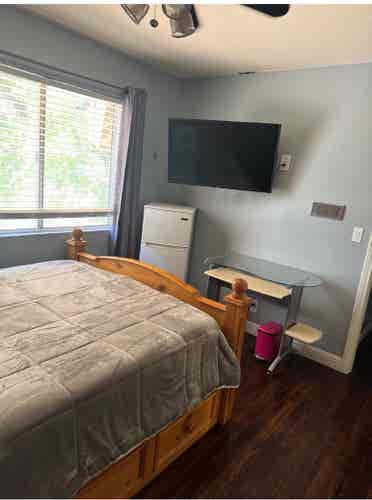 Furnished room with walking closet