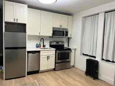 HIGH Ceilings + Laundry/Dishwasher
