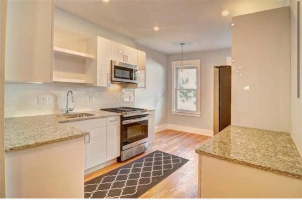 2BR with backyard, balcony+ storage