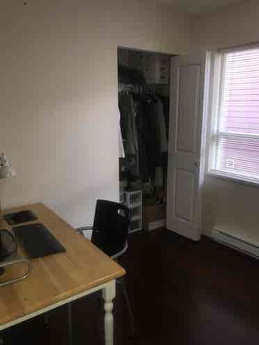 A furnished room with private bath