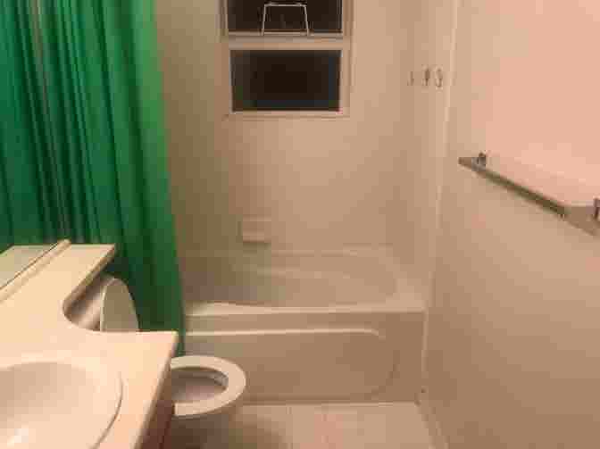 A furnished room with private bath