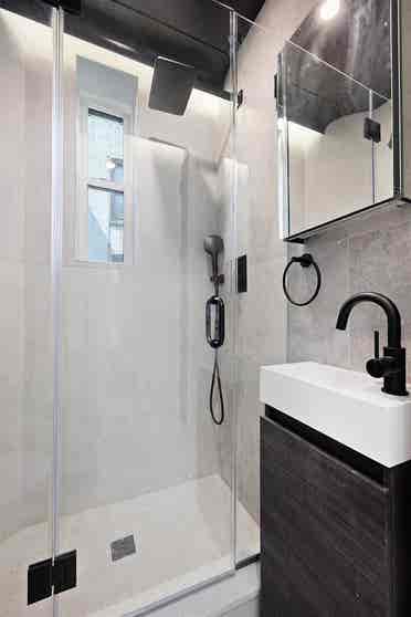 Renovated white small room in 2bd