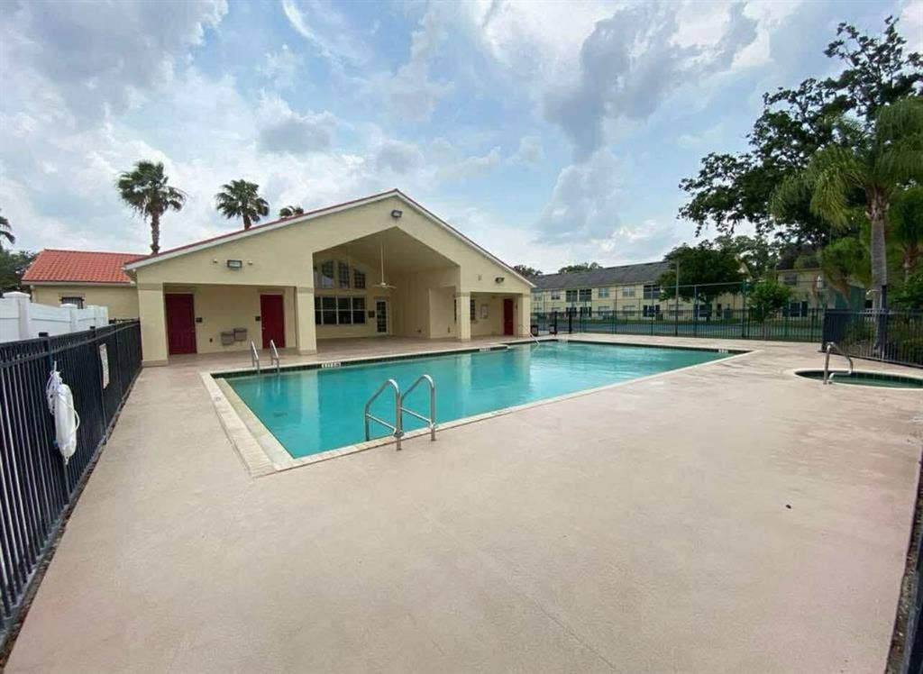 A master bedroom with a bathroom