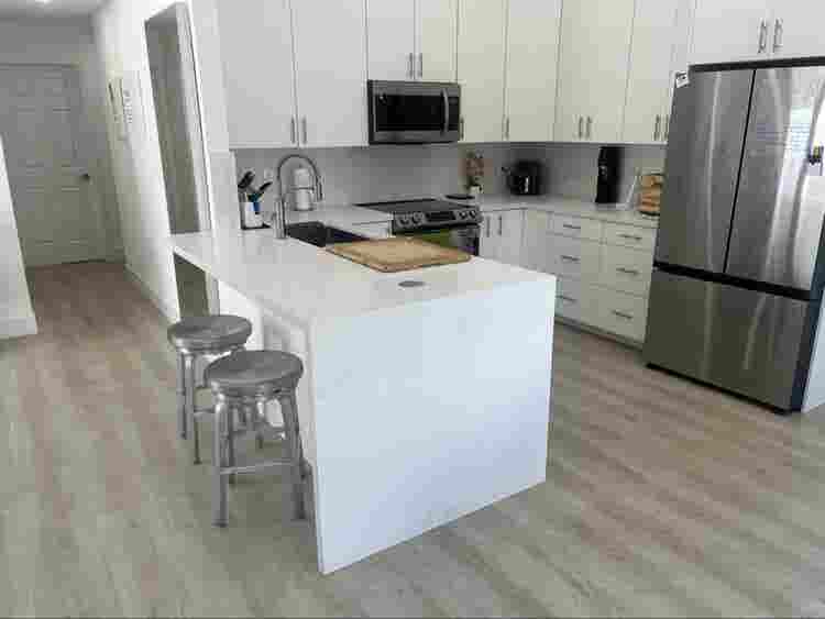 furnished room with shared bathroom