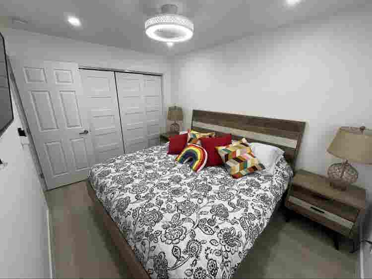 furnished room with shared bathroom