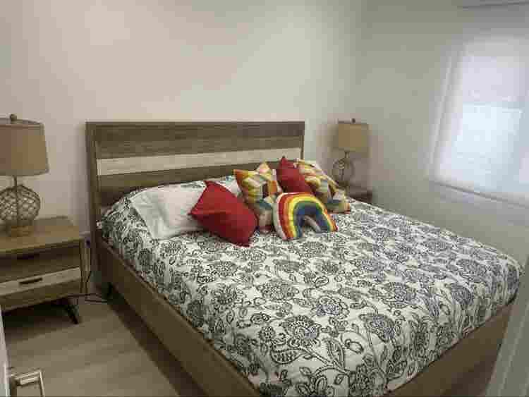 furnished room with shared bathroom