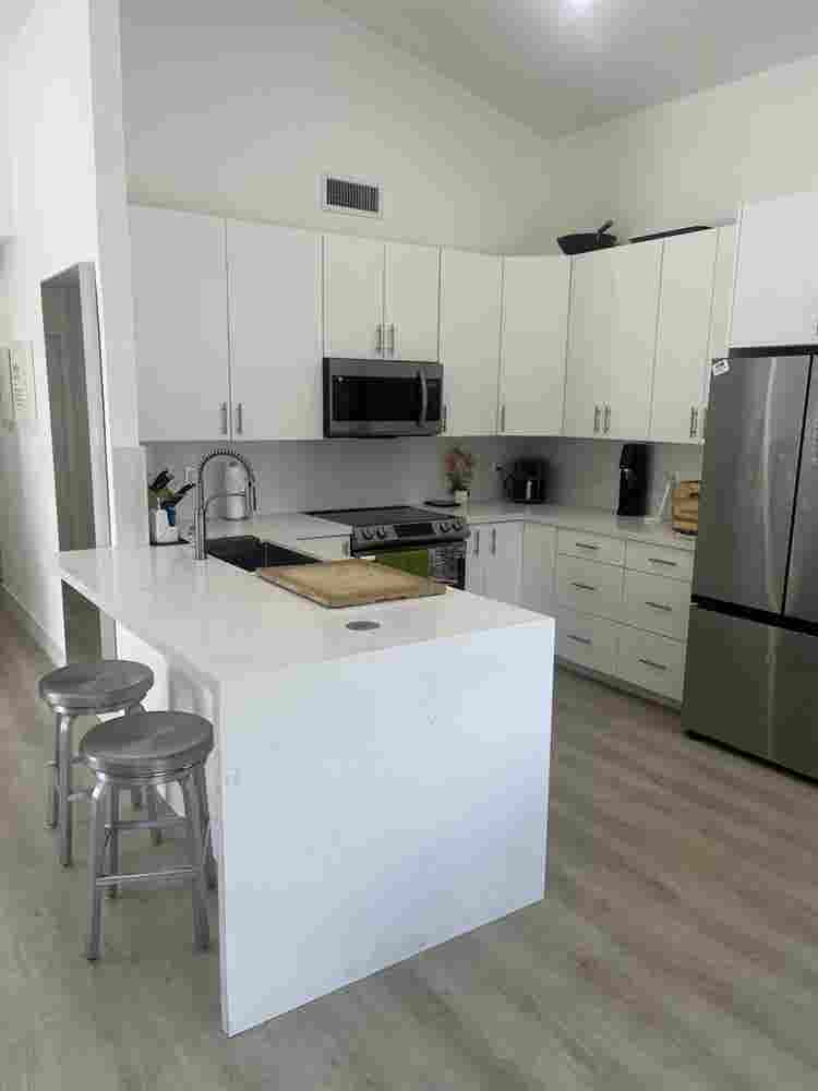 furnished room with shared bathroom