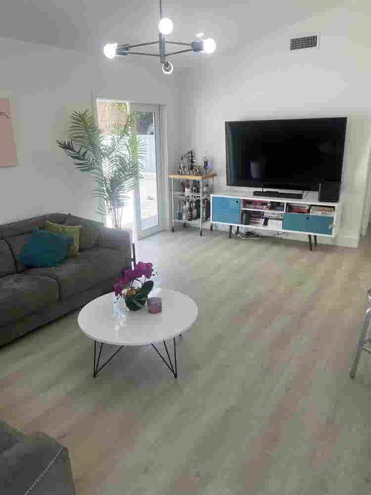furnished room with shared bathroom