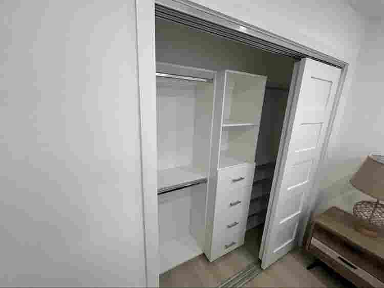 furnished room with shared bathroom