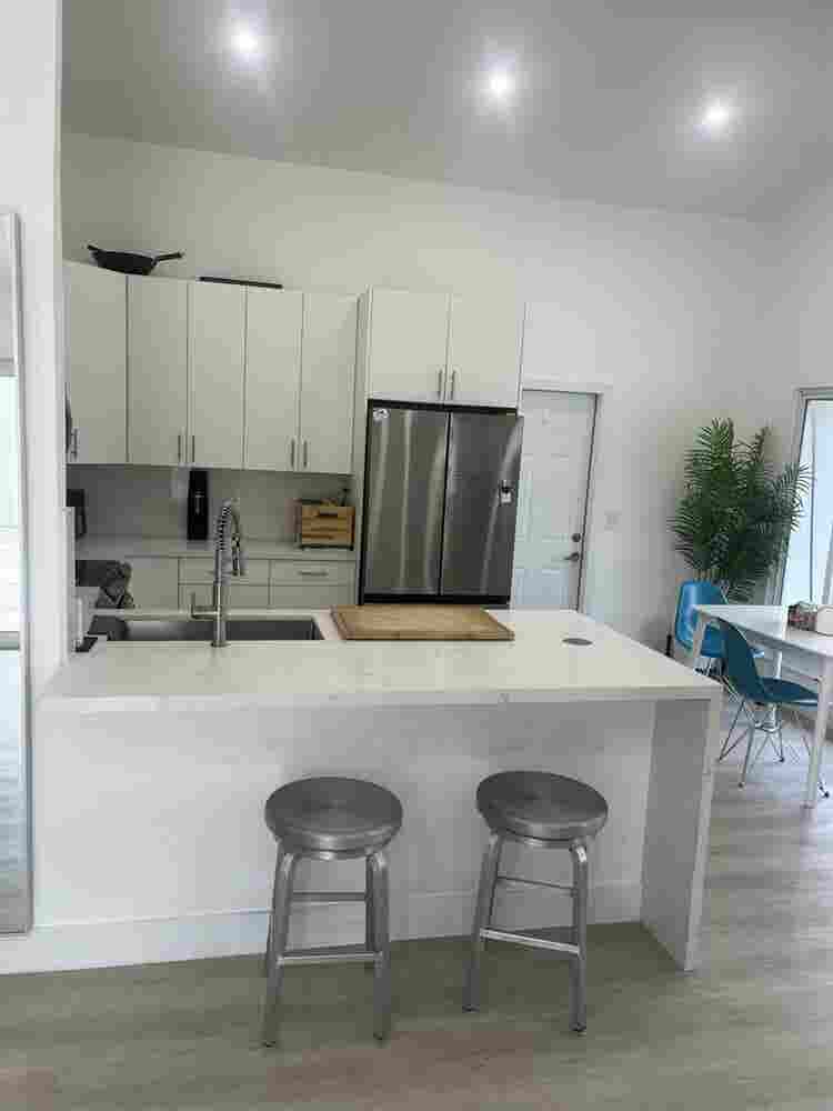 furnished room with shared bathroom