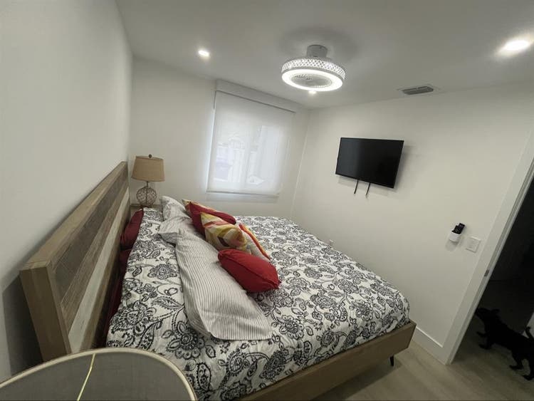 furnished room with shared bathroom
