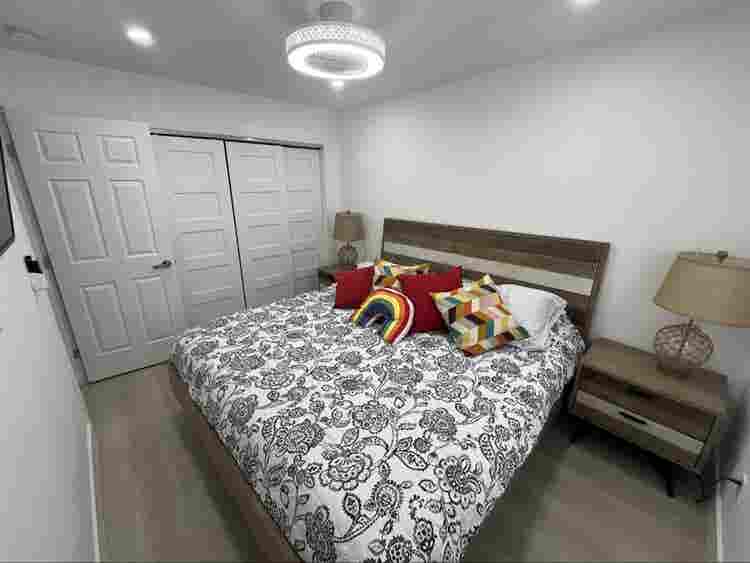 furnished room with shared bathroom