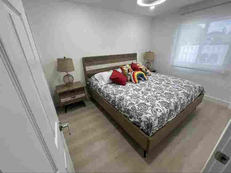 furnished room with shared bathroom