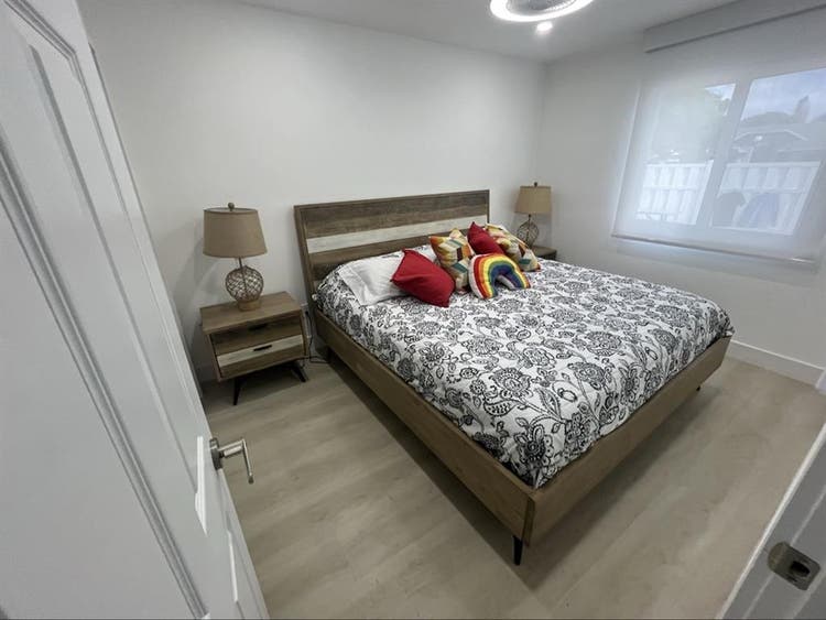 furnished room with shared bathroom