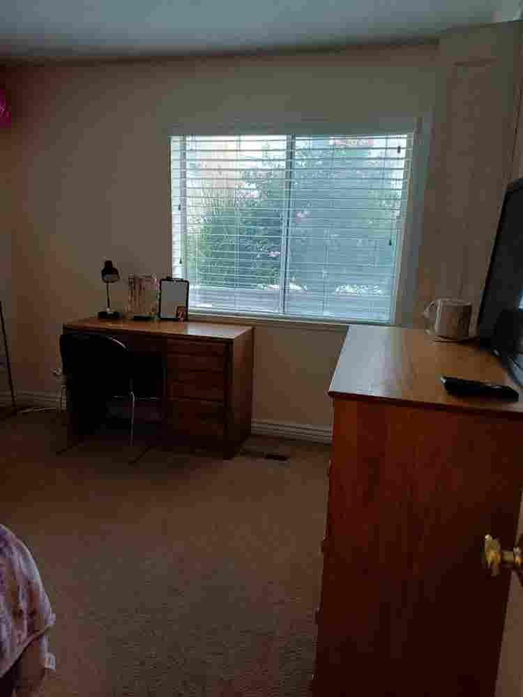 Room at Riverside Apartments
